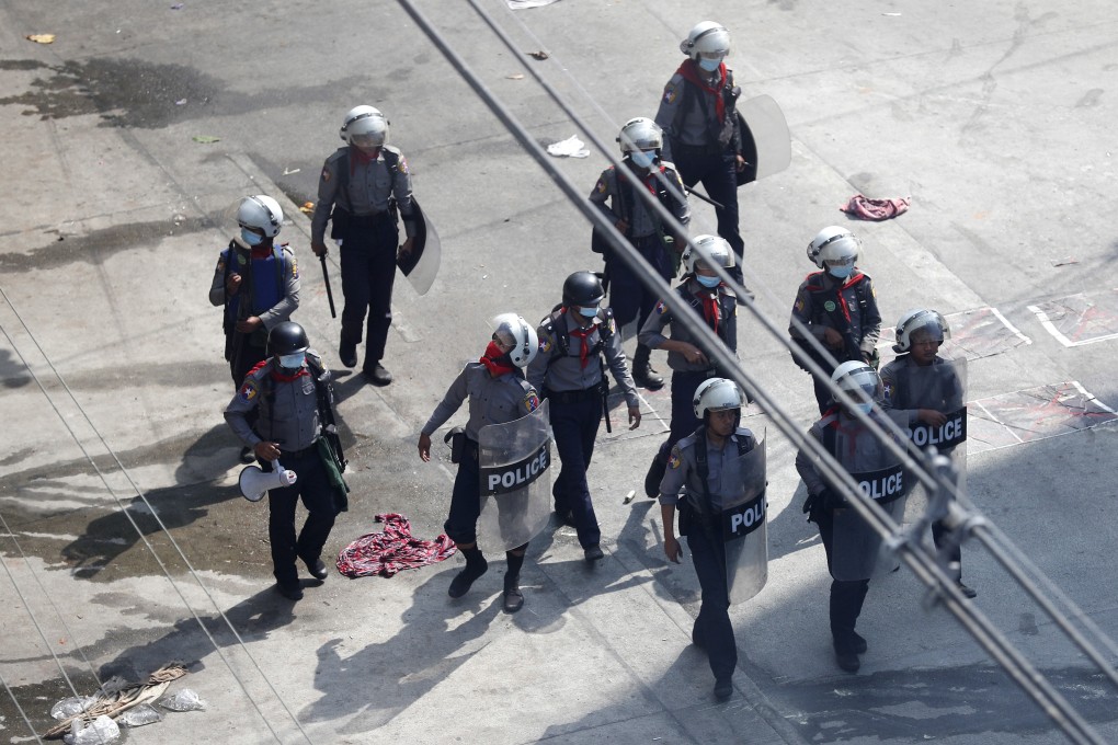 Riot police officers in Yangon. Photo: EPA