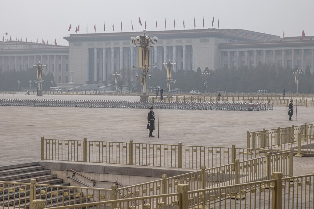 Paramilitary police officers stand guard at Tiananmen Square before the opening session of the Chinese People's Political Consultative Conference at the Great Hall of the People in Beijing on Thursday. Photo: EPA-EFE