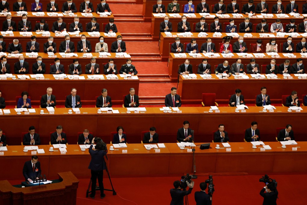 China Premier Li Keqiang delivered the government work report for 2021 at the National People’s Congress on Friday in Beijing. Photo: Reuters