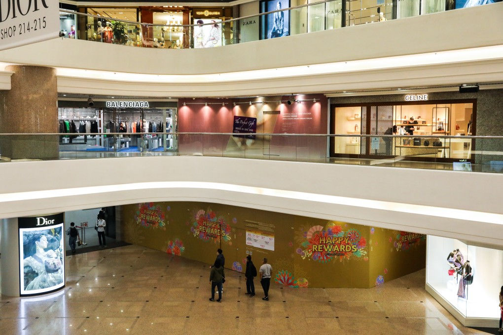 The shuttered Fendi shop, above, and closed Louis Vuitton store, bottom, in Times Square. Photo: May Tse