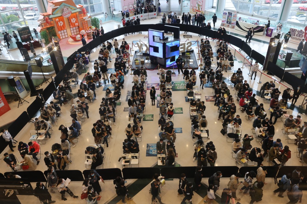 Buyers queueing for CK Asset's Sea to Sky property project at the developer’s sales office at the Metropolis in Hung Hom on March 6, 2021. Photo: Dickson Lee