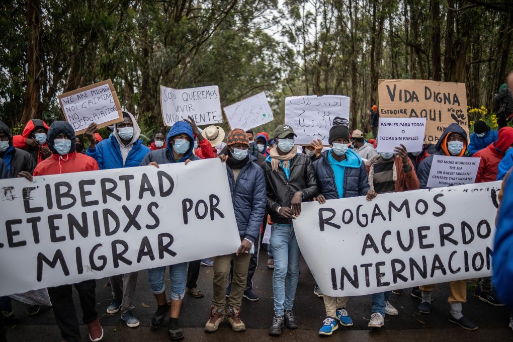 Migrants and local supporters take part in a protest march from Las Raices camp to San Cristobal de la Laguna on the island of Tenerife to demand permission to travel to Spain's mainland. Photo: DPA
