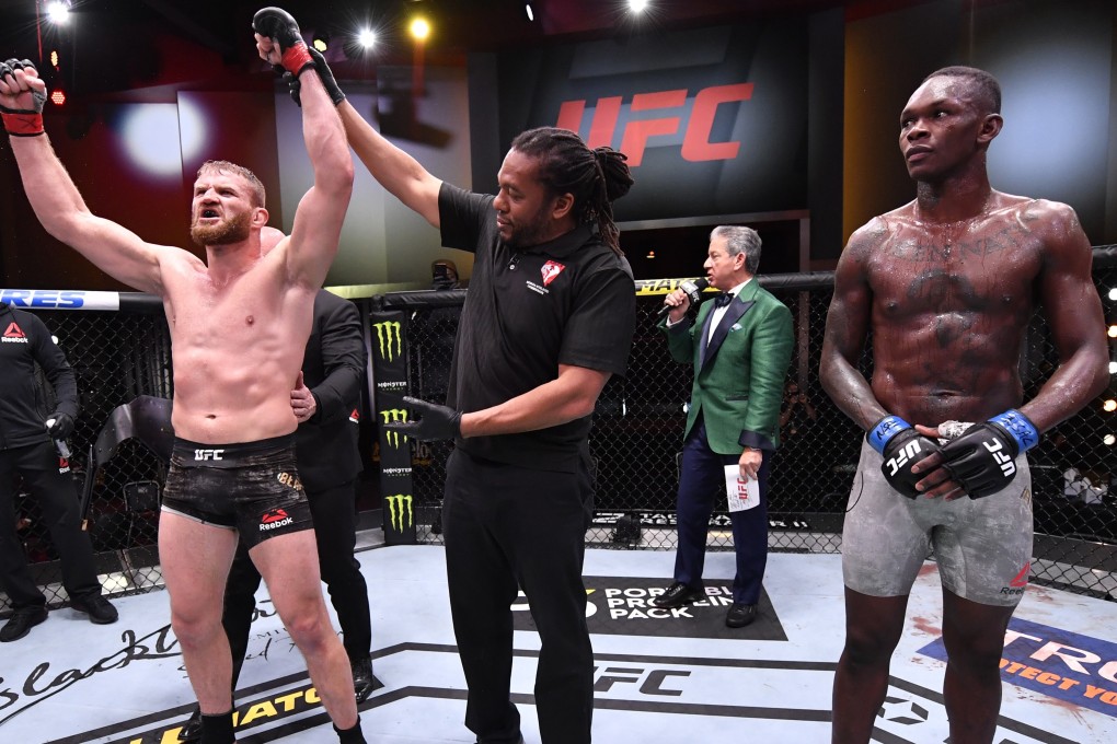 Jan Blachowicz celebrates after his victory over Israel Adesanya in their light heavyweight championship fight during UFC 259. Photo: Jeff Bottari/Zuffa LLC
