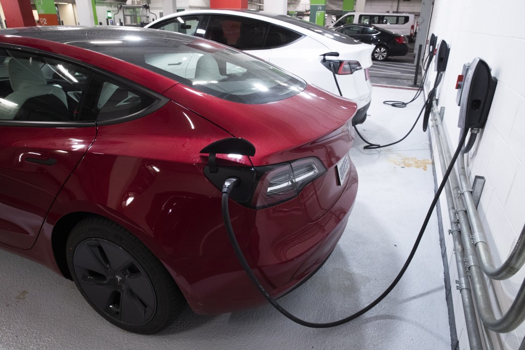 Tesla electric vehicles charging in a garage. Photo: EPA-EFE