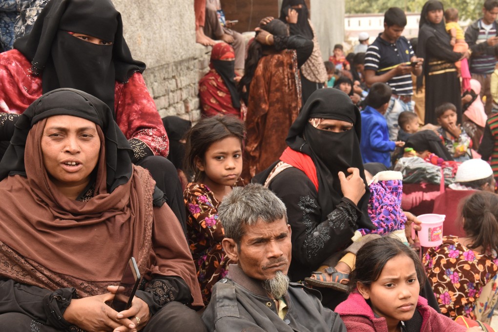 Rohingya Muslims from Myanmar gather outside a mosque on Sunday in Jammu city. At least 168 of their number face possible deportation back to Myanmar. Photo: EPA-EFE