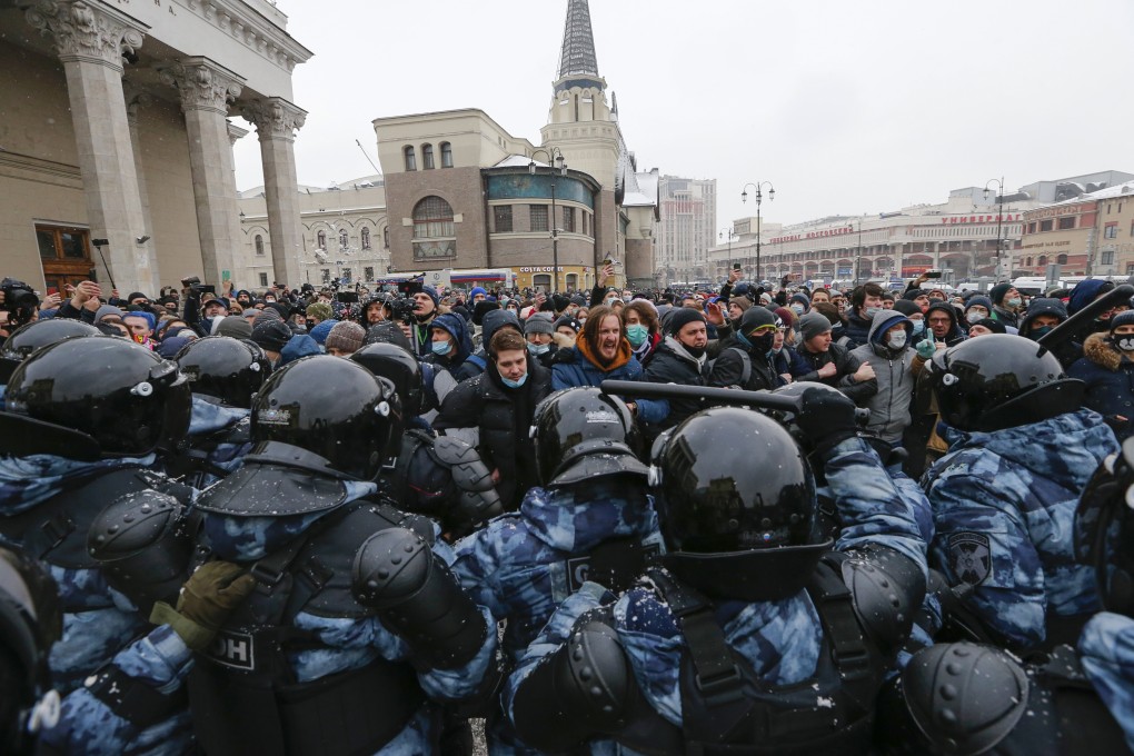 People clash with police during a protest against the jailing of opposition leader Alexei Navalny in Moscow, on January 31, 2021. The January protests were the largest outpouring of discontent in years and appeared to have rattled the Kremlin. Police reportedly arrested about 10,000 people. Photo: AP Photo