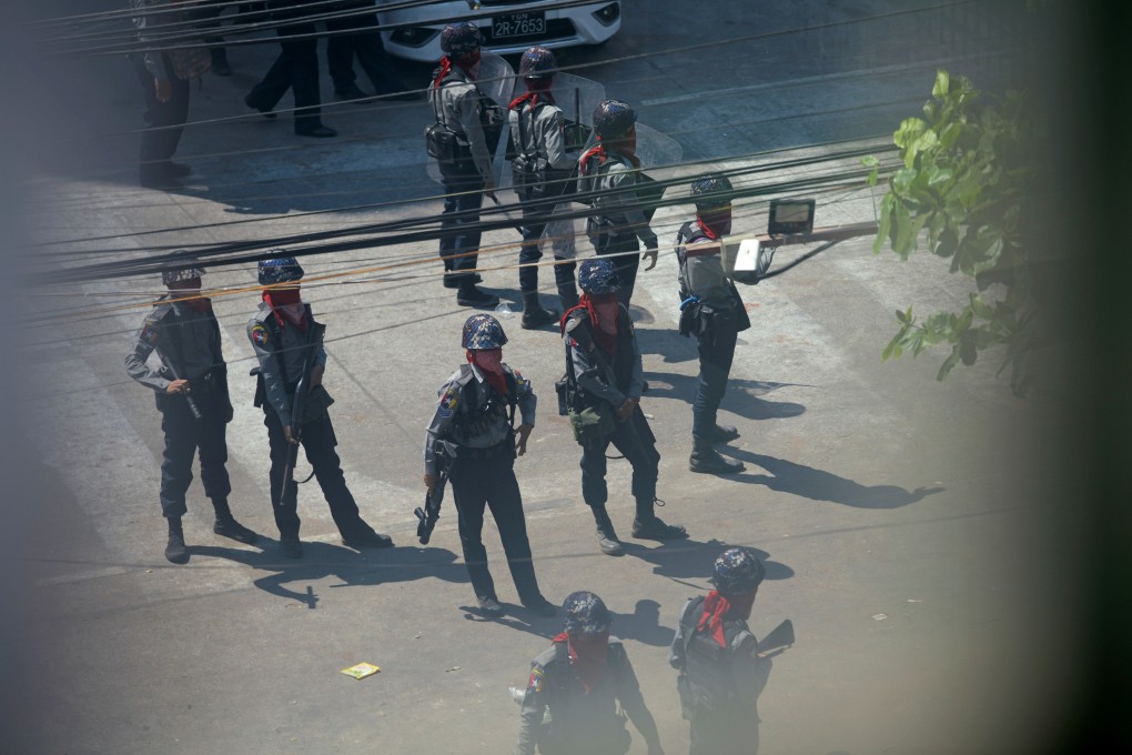 Myanmar security forces pictured after closing off the Sanchaung district of Yangon in search of anti-coup demonstrators on Monday. Photo: Reuters