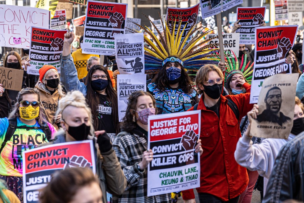 Demonstrators protest outside the Hennepin County Government Centre before jury selection at the trial of former policeman Derek Chauvin in Minneapolis on Monday. Photo: AFP