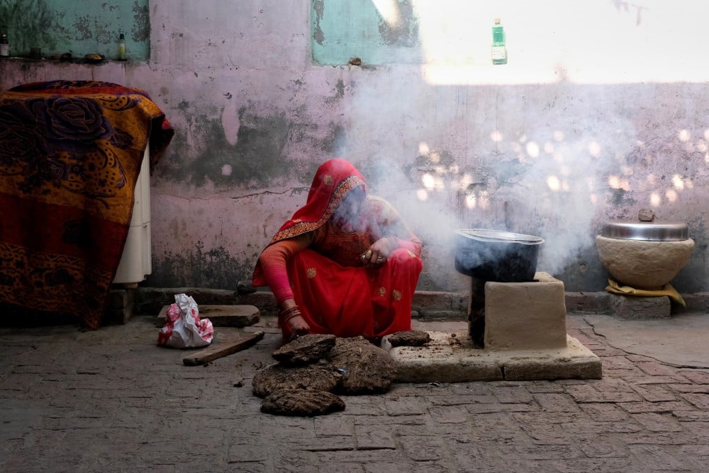 Smoke bellows from a domestic hearth known as a ‘chulha’ that is fuelled using dung cakes in Greater Noida, Uttar Pradesh, last month. Photo: Bloomberg