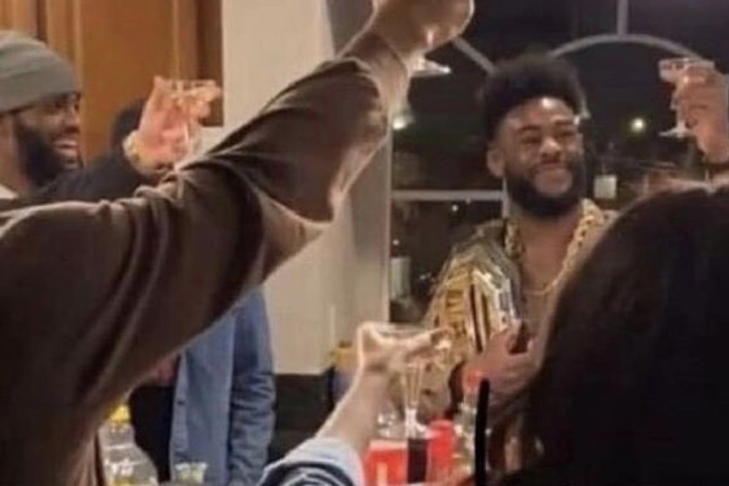 Aljamain Sterling toasts drinks with his friends and family after winning the UFC bantamweight title. Photo: Instagram