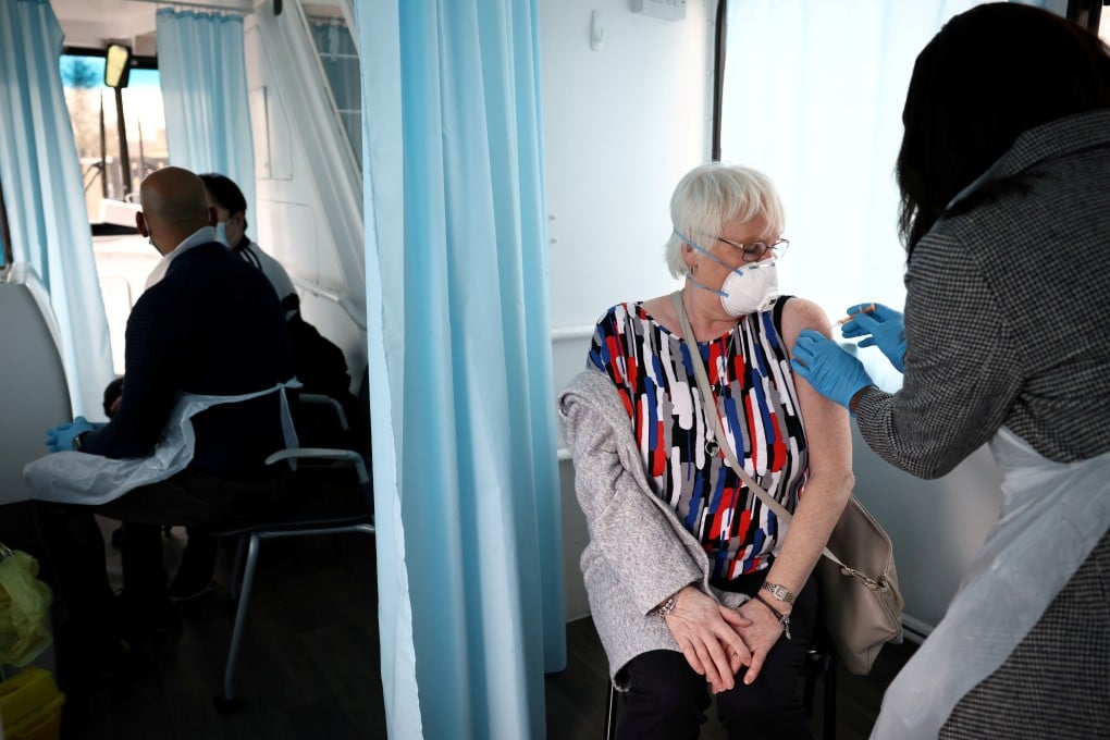 A woman receives a dose of the AstraZeneca Covid-19 vaccine in London. File photo: Reuters
