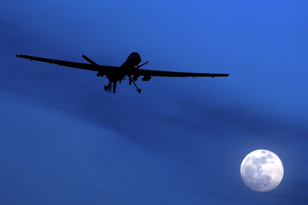 A US Predator drone flies over Kandahar Air Field, southern Afghanistan, in January 2010. Photo: AP
