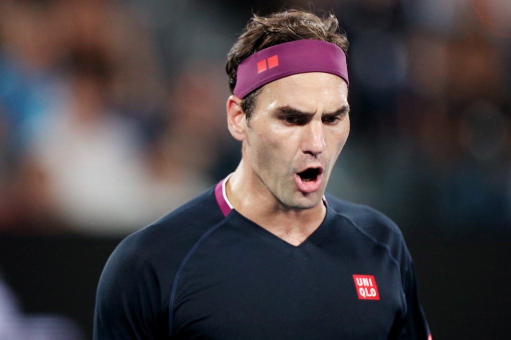 Roger Federer of Switzerland celebrates after winning a point against Serbia's Novak Djokovic at the Australian Open. Photo: Reuters
