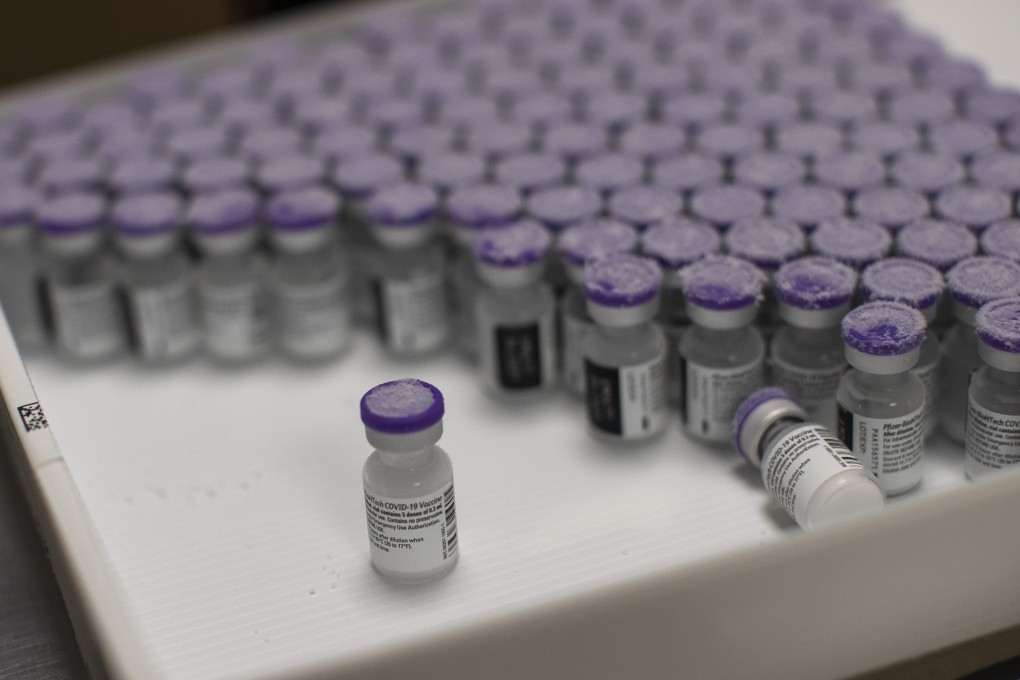 Frozen vials of the Pfizer-BioNTech Covid-19 vaccine are taken out to thaw at a hospital in Liege, Belgium. Photo: AP