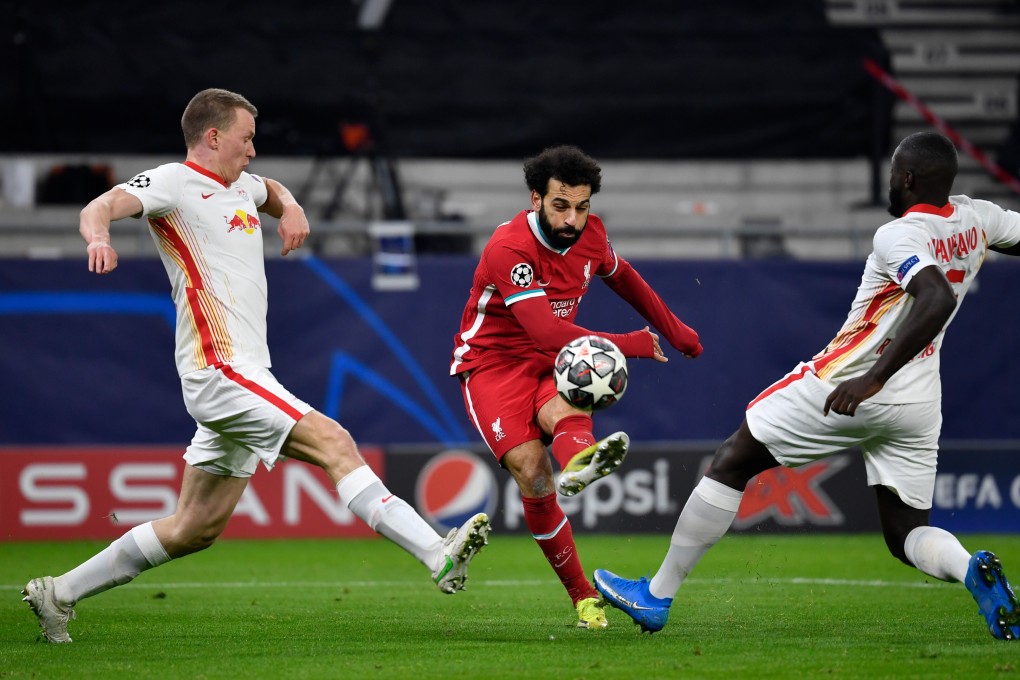 Liverpool’s Mohamed Salah was on the scoresheet as they eliminated RB Leipzig at Puskas Arena. Photo: DPA