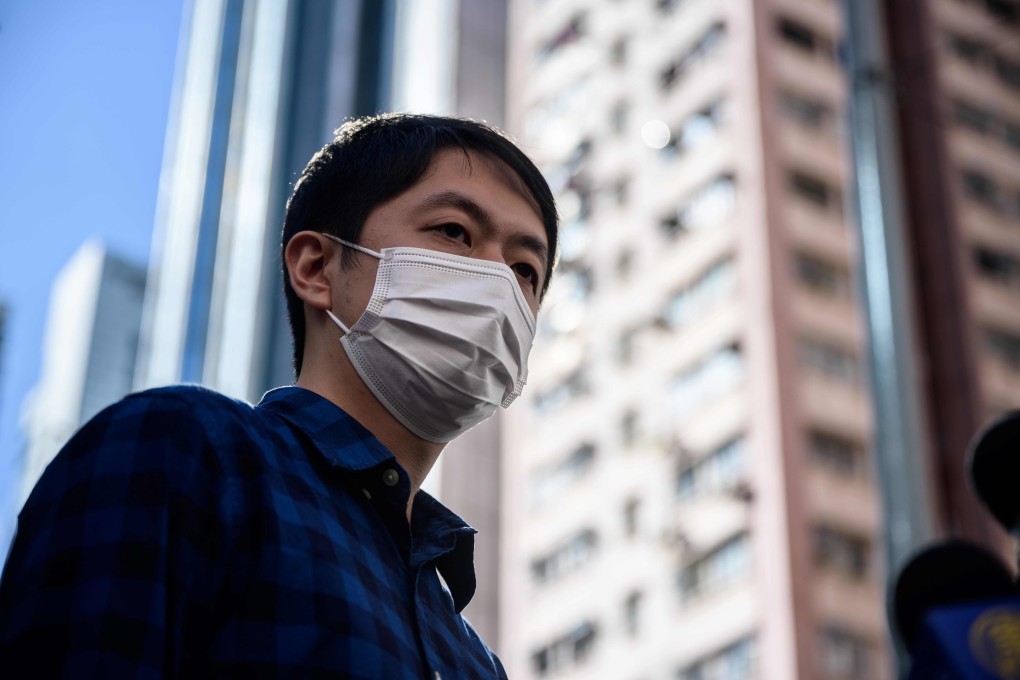 Former lawmaker from Hong Kong's pro-democracy opposition Ted Hui speaks to the media as he leaves the Western Police Station in Hong Kong on November 18, 2020, following his arrest in connection with throwing foul-smelling objects inside the city's legislature earlier this year. (Photo by Anthony WALLACE / AFP)