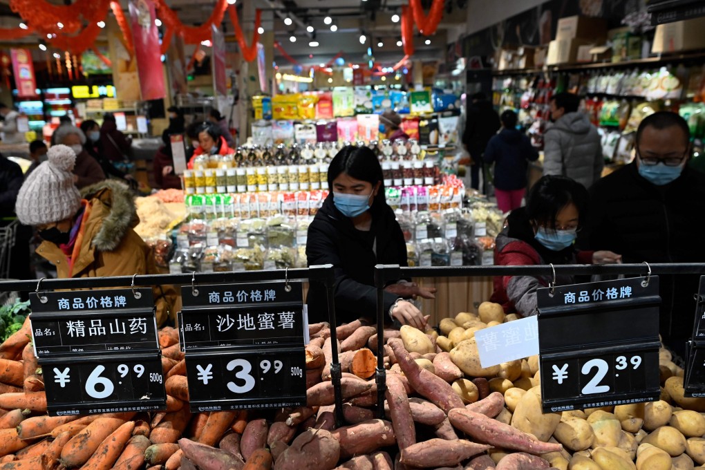 China’s consumer price index (CPI) eased to minus 0.2 per cent in February from a year earlier, from minus 0.3 per cent in January. Photo: AFP