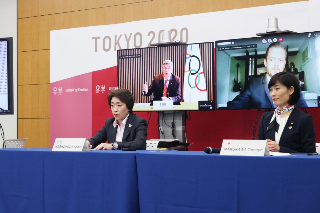 Seiko Hashimoto (second from right, front row), president of the Tokyo Olympic and Paralympic organising committee, and Japan’s Olympic minister Tamayo Marukawa (right, front row) in Tokyo during a teleconference with International Olympic Committee president Thomas Bach. Photo: Kyodo