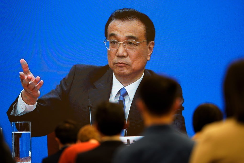 Premier Li Keqiang addresses the closing press conference of the legislative meeting in Beijing on Thursday. Photo: EPA-EFE