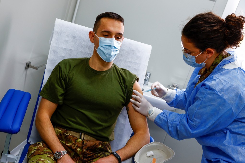 An Italian soldier receives a dose of the AstraZeneca Covid-19 vaccine in Rome on Tuesday. Photo: Reuters