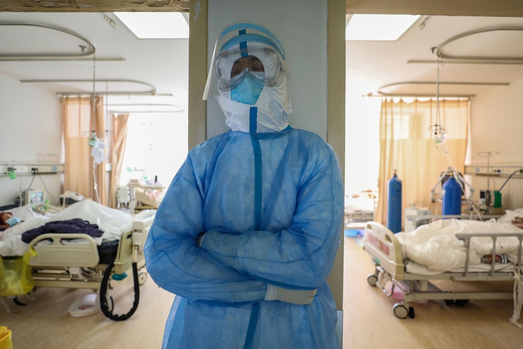 A member of the Wuhan Red Cross Hospital staff on break on February 16, 2020. Following the coronavirus outbreak in Wuhan, Chinese officials suggested last year that the country’s public health sector might be revamped. Photo: STR/AFP via Getty Images
