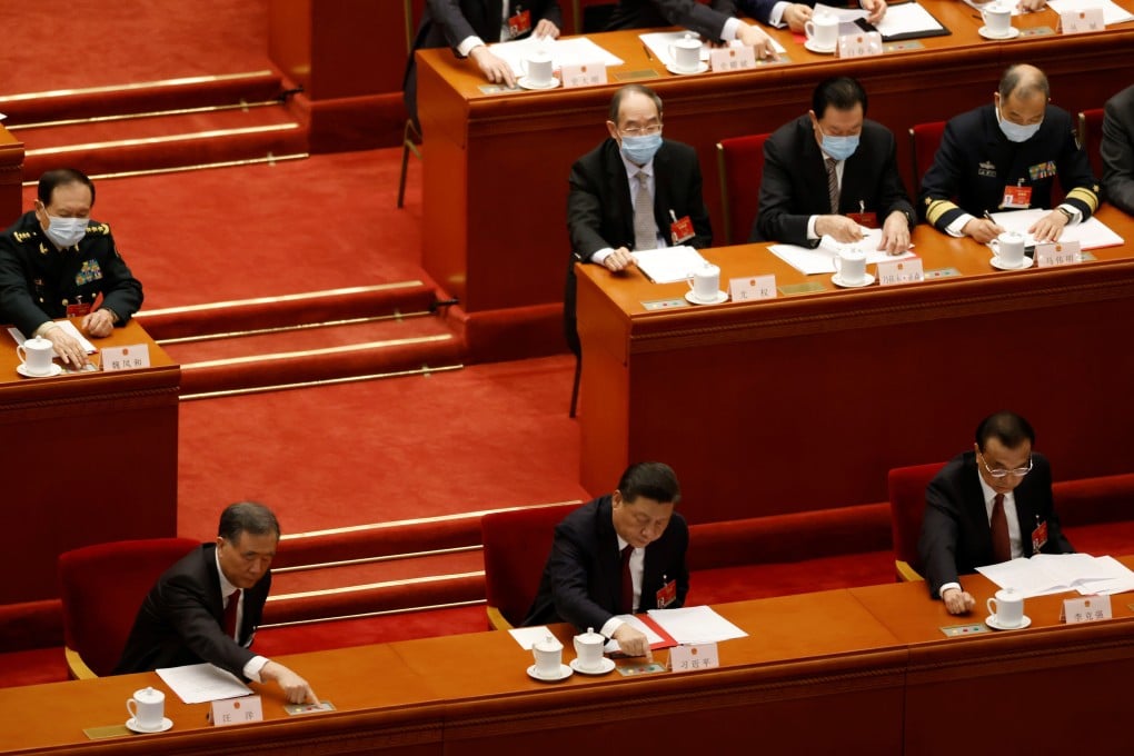 Chinese leaders cast their votes on Hong Kong electoral reform at the closing session of the National People’s Congress in Beijing. Photo: Reuters