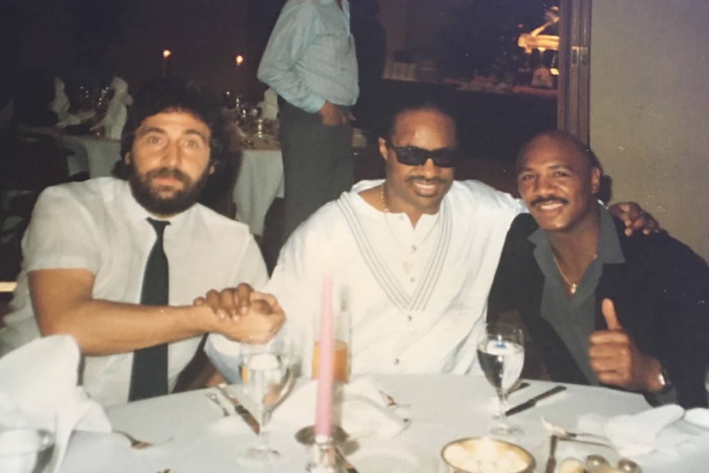 ‘Marvelous’ Marvin Hagler at a party in Hong Kong with Stevie Wonder and Derek Currie. Photo: Handout