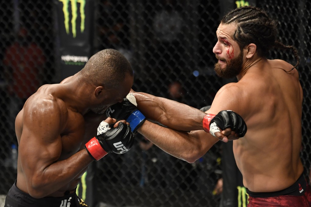 Jorge Masvidal punches Kamaru Usman in their welterweight championship fight during UFC 251 at Flash Forum on UFC Fight Island on July 12, 2020 in Abu Dhabi. Photo: Jeff Bottari/Zuffa LLC via USA TODAY Sports