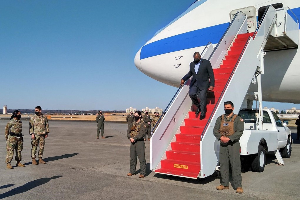 US Secretary of Defence Lloyd Austin arrives at the Yokota airbase in Tokyo on Monday. Photo: AFP