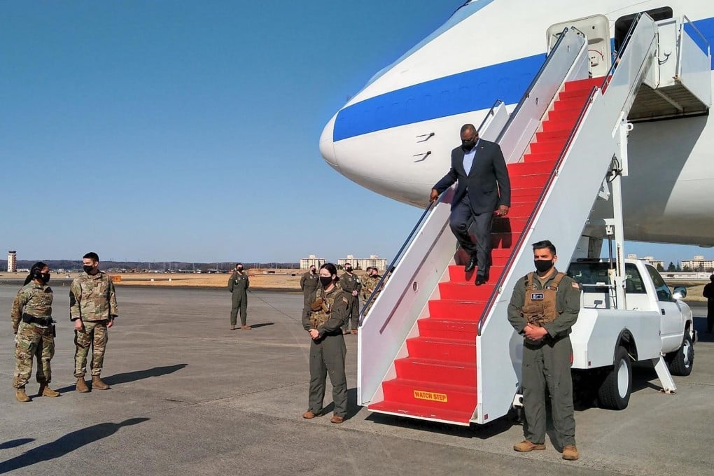 US Secretary of Defence Lloyd Austin arrives at the Yokota airbase in Tokyo on Monday. Photo: AFP