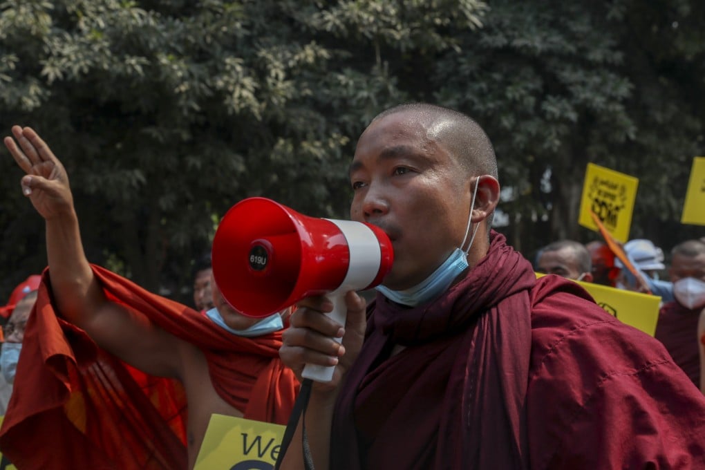 Buddhist monks lend their support to anti-coup protesters in Mandalay. Photo: AP