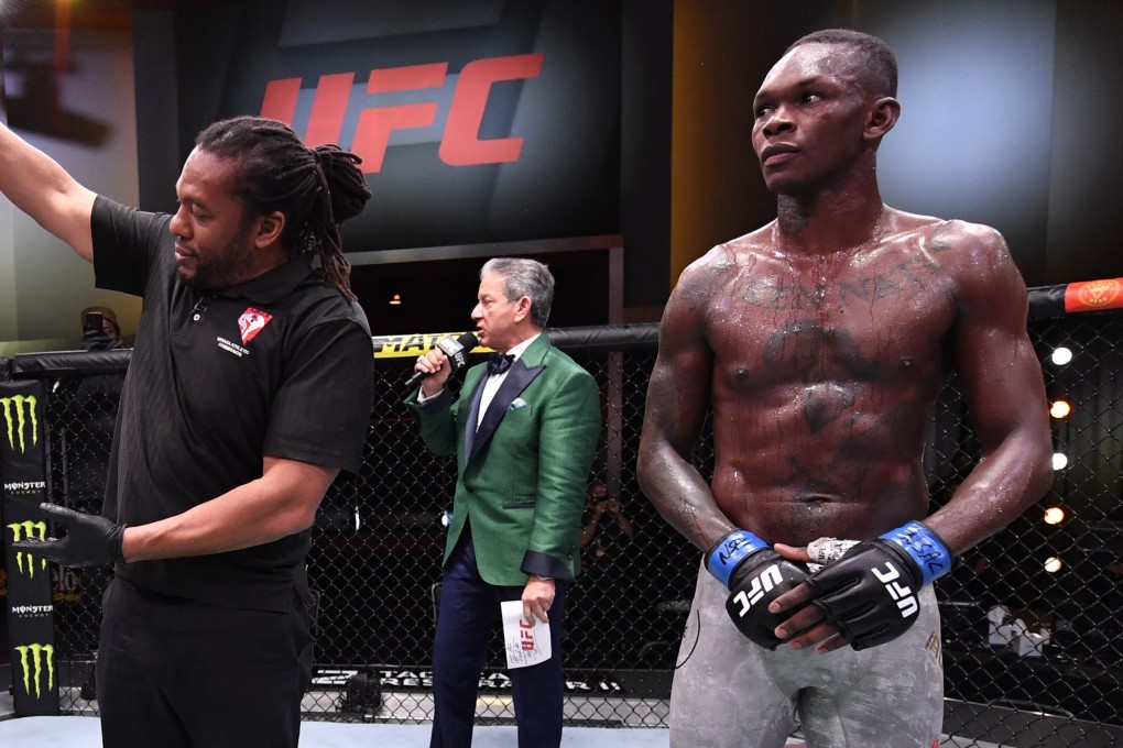 Israel Adesanya looks on after his defeat by Jan Blachowicz in their UFC light heavyweight championship fight during the UFC 259 event at UFC APEX on March 06, 2021 in Las Vegas, Nevada. Photos: Jeff Bottari/Zuffa LLC