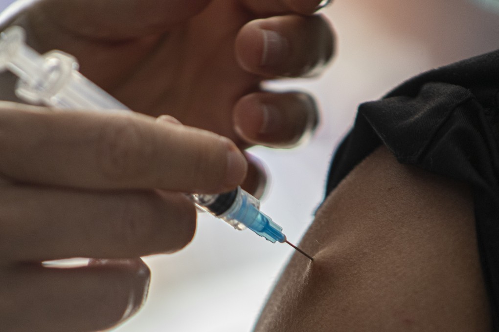 Beijing has made it easier for foreign workers to return to China, as long as they have been injected with a locally made vaccine. Photo: AP