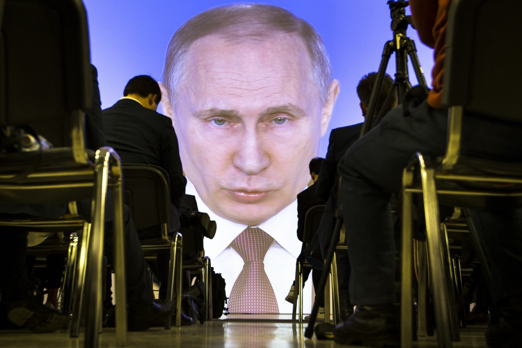 President Vladimir Putin gives his annual state of the nation address in Moscow in 2018. He has been in power for more than two decades. File photo: AP