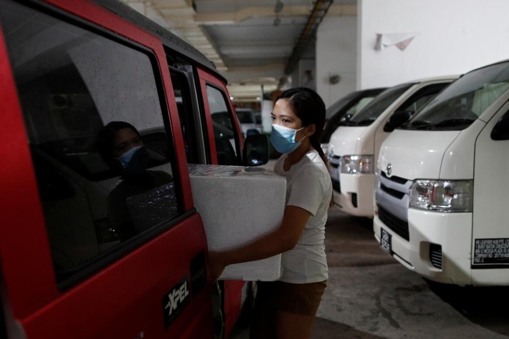 Travelling back and forth from Singapore has become more difficult for Malaysian drivers during the coronavirus pandemic. Photo: Reuters
