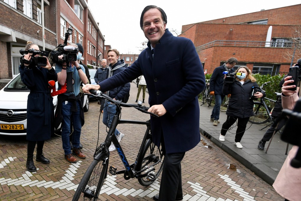 Regularly seen riding his bike, Mark Rutte typifies Dutch ideas of a frugal, ‘normal guy’. Photo: Reuters