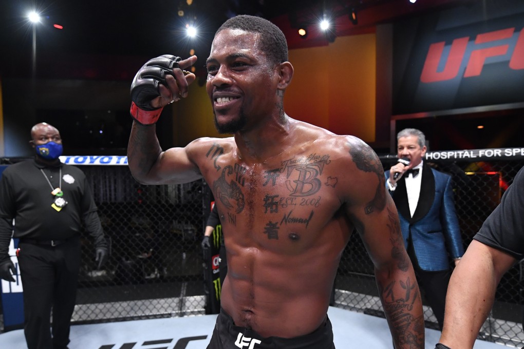 Kevin Holland celebrates his KO victory over Jacare Souza in their middleweight bout at UFC 256. Photo: Jeff Bottari/Zuffa LLC