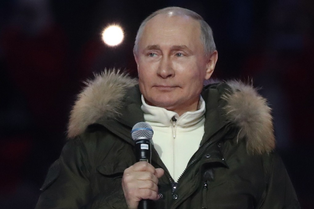 Russian President Vladimir Putin speaks during the concert marking the seventh anniversary of the annexation of Crimea in Moscow on Thursday. Photo: Sputnik via EPA-EFE