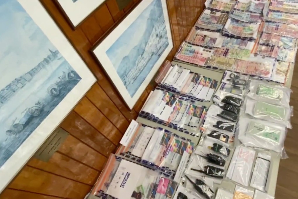 Officers seized about HK$50,000 in cash, account books and walkie-talkies from their possession. Photo: Facebook