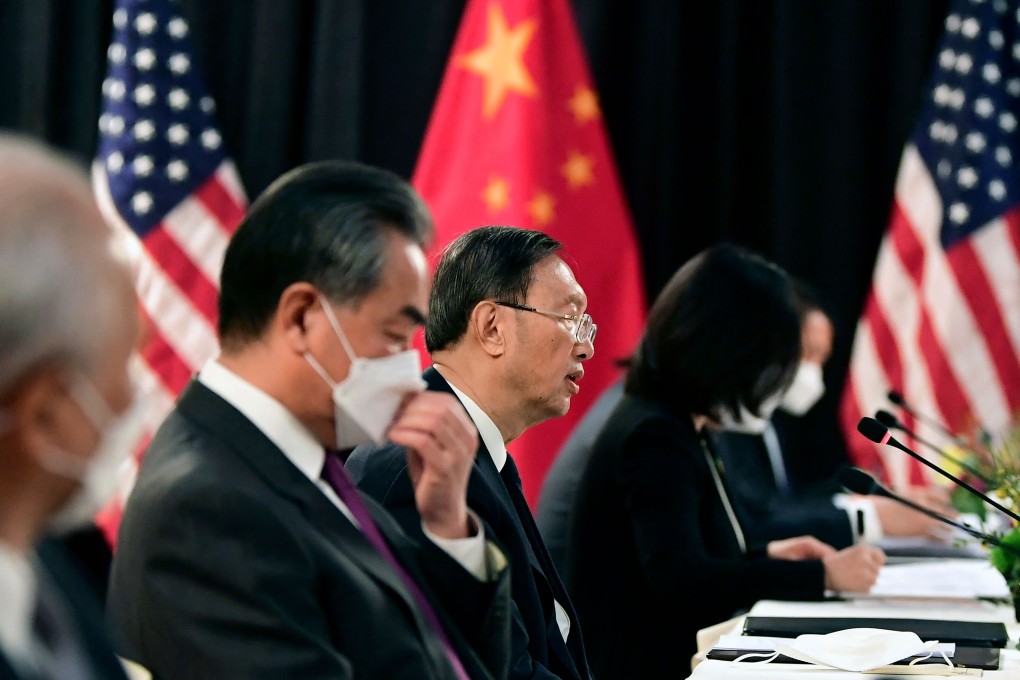 The Chinese delegation led by Yang Jiechi (centre), director of the Central Foreign Affairs Commission Office and Wang Yi (centre left), China’s Foreign Minister, speak with their US counterparts at the opening session of US-China talks at the Captain Cook Hotel in Anchorage, Alaska on March 18, 2021. Photo: AFP