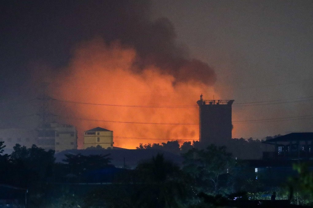 A fire burns at a Chinese-owned factory in Hlaingthaya township, on the outskirts of Yangon, Myanmar. Photo: EPA
