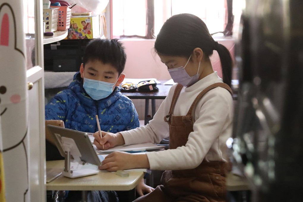 Children attend online classes at home in Tsuen Wan amid the coronavirus pandemic. Photo: K. Y. Cheng