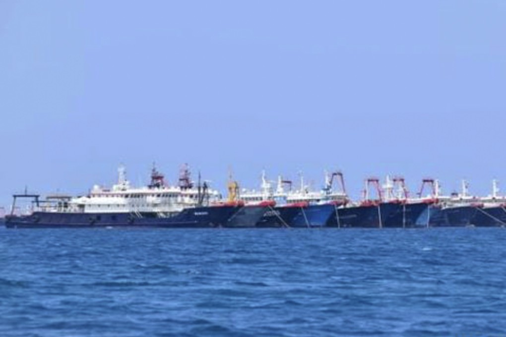 Some of the 220 Chinese vessels are seen moored at Whitsun Reef in this photo provided on Sunday. Photo: Philippine Coast Guard/National Task Force-West Philippine Sea via AP