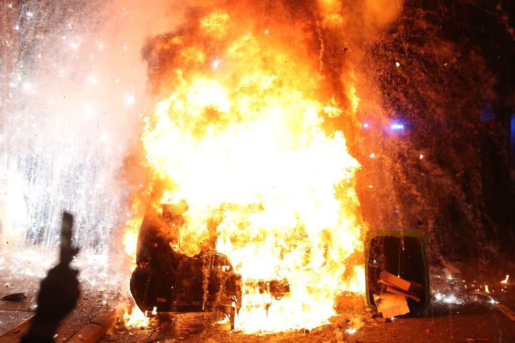 A vandalised police van explodes outside Bridewell Police Station in Bristol during a ‘Kill the Bill’ protest against the UK’s controversial Police and Crime Bill. Photo: PA / DPA