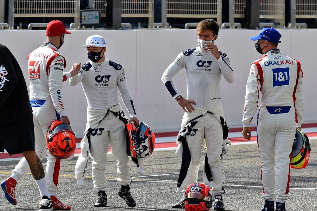 Yuki Tsunoda (third from the left) greets rival Mick Schumacher ahead of the first day of preseason testing in Bahrain. Both will make their F1 bow this weekend. Photo: AFP