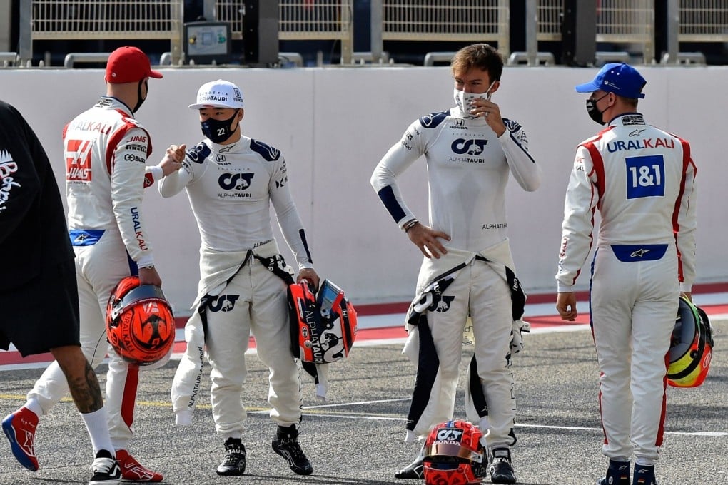 Yuki Tsunoda (third from the left) greets rival Mick Schumacher ahead of the first day of preseason testing in Bahrain. Both will make their F1 bow this weekend. Photo: AFP