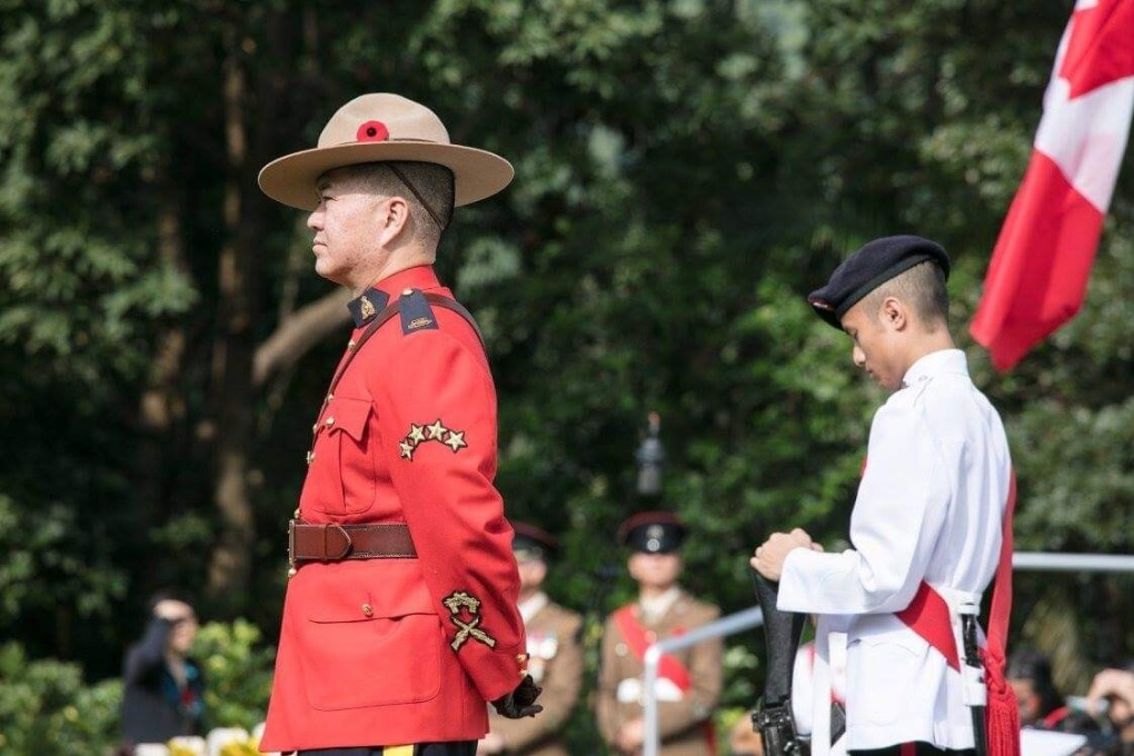Ben Chang, who was the Royal Canadian Mounted Police liaison officer in Hong Kong, attends a commemorative ceremony at the Sai Wan War Cemetery in December 2017. Photo: SCMP/Global Affairs Canada