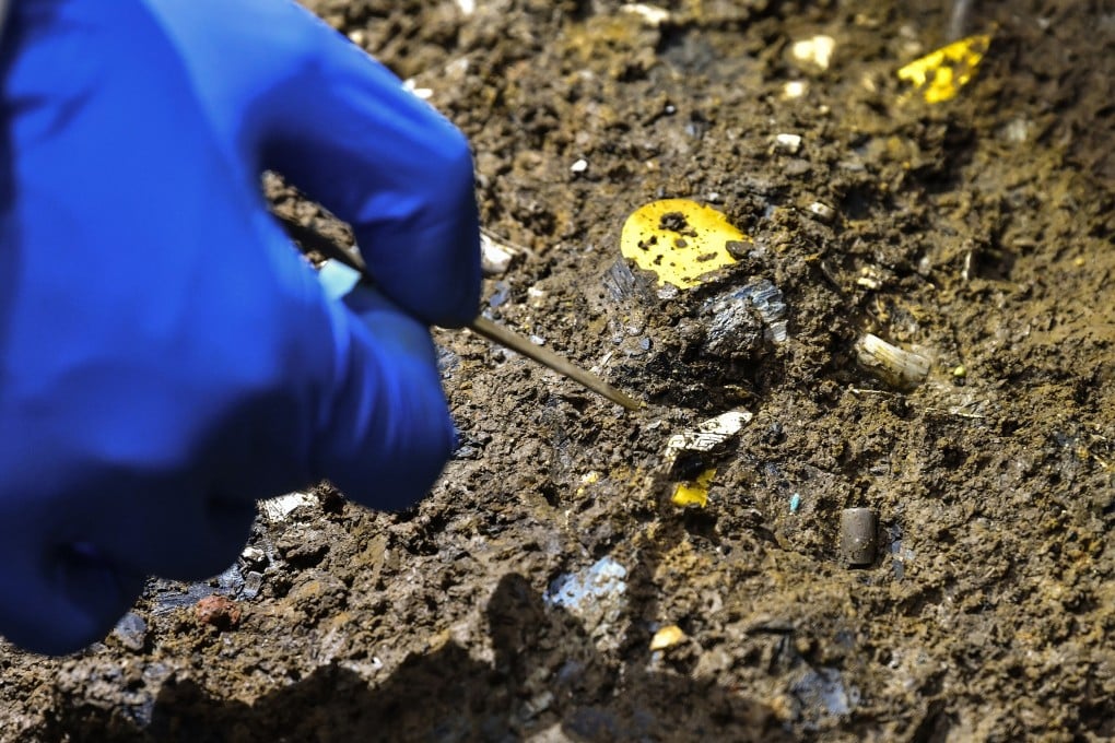 A number of thin gold discs have been found at pit No 5. Photo: Xinhua