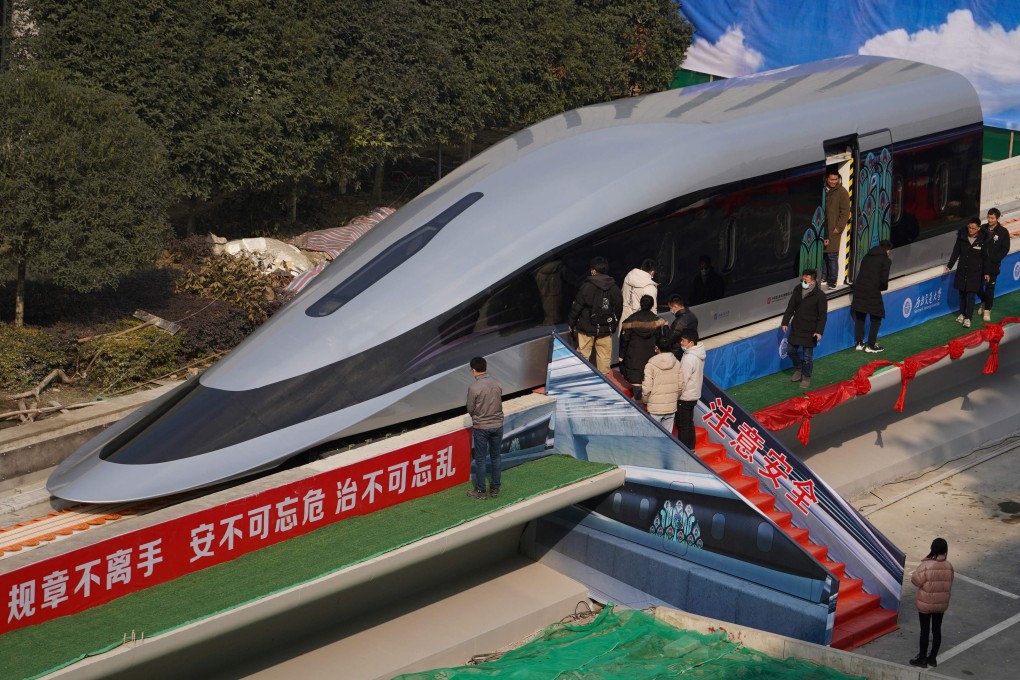 People visit a prototype of China’s new superfast maglev train in Chengdu in January. Photo: AFP