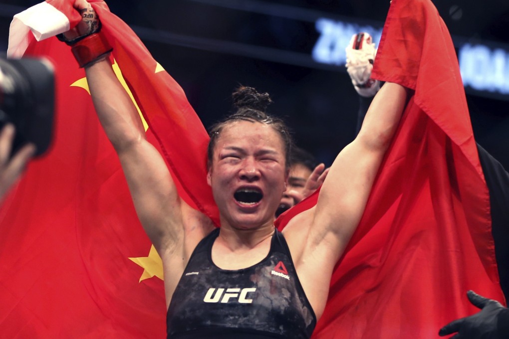 Zhang Weili celebrates after a successful first UFC strawweight title defence against Joanna Jedrzejczyk. Photo: AP